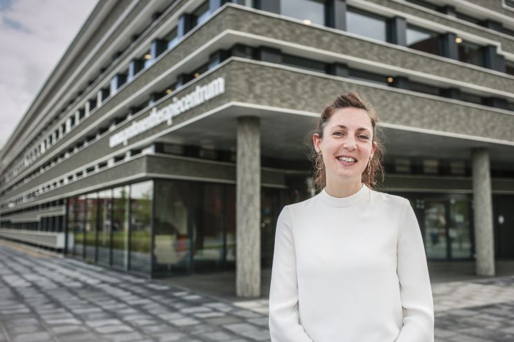 Antje Knopf in front of the UMCG proton therapy center. (Photo: Henk Veenstra)